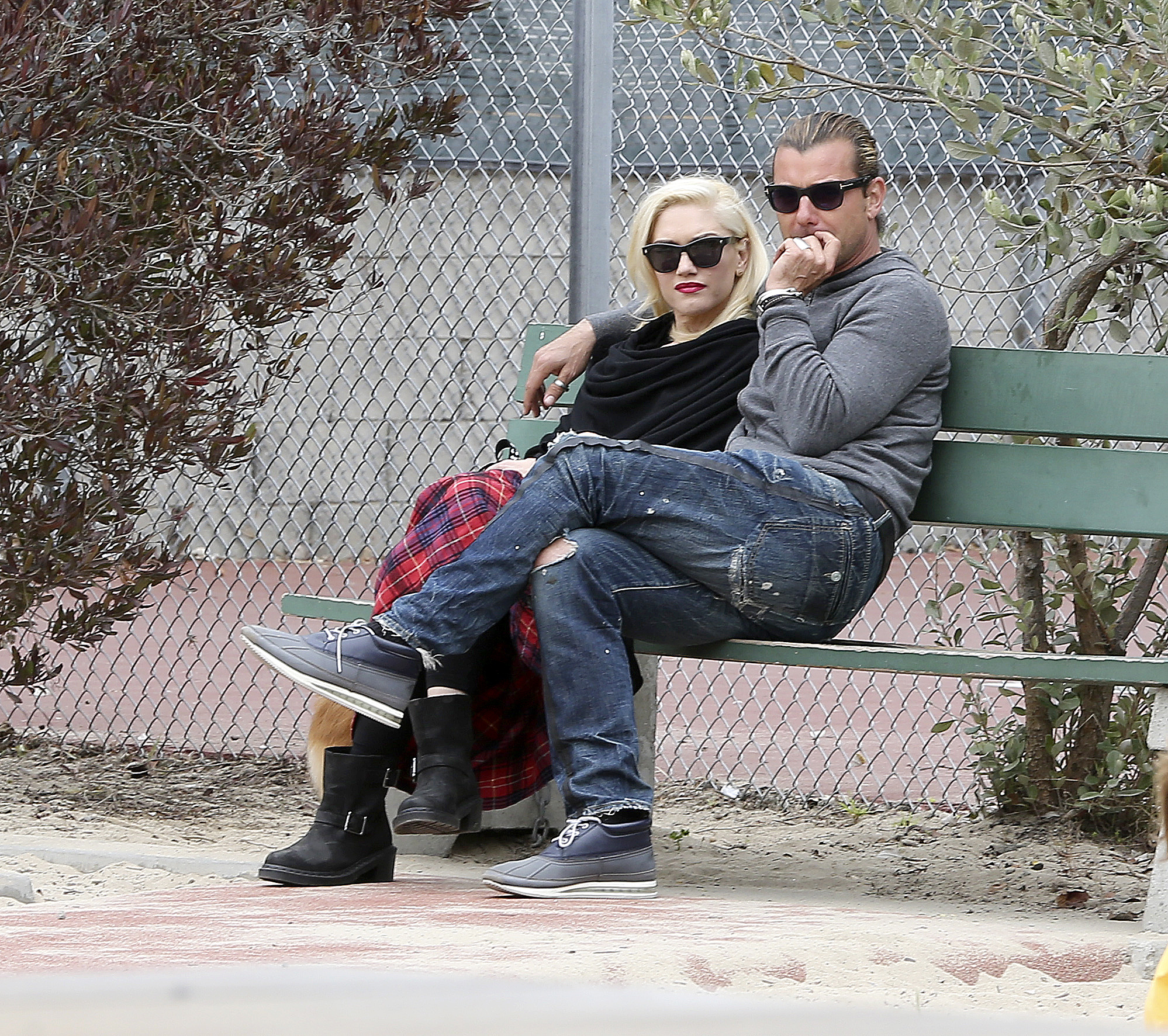 Brentwood, CA - Gwen Stefani and her hubby Gavin Rossdale get some family time with their kids, Kingston and Zuma at the park this afternoon.  While the boys played, Gwen and Gavin cuddled up on a bench and had some laughs.  At one point the 