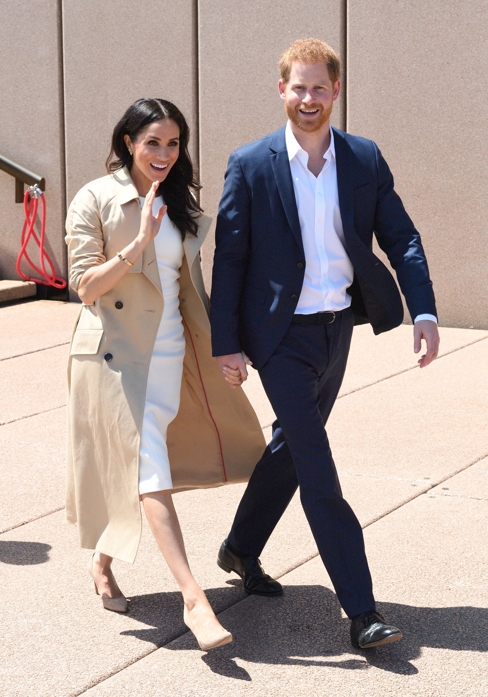 Prince Harry The Duke of Sussex and a pregnant Meghan Duchess of Sussex on a public walkabout at the Sydney Opera House.,Image: 391216541, License: Rights-managed, Restrictions: , Model Release: no, Credit line: Doug Peters / PA Images / Profimedia