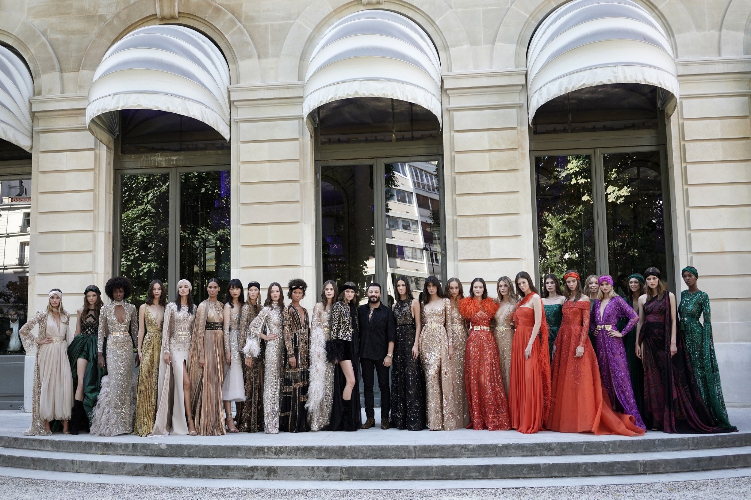 PARIS, FRANCE - JULY 03: Models pose with Designer Zuhair Murad after the Zuhair Murad Haute Couture Fall/Winter 2019 2020 show as part of Paris Fashion Week on July 03, 2019 in Paris, France. (Photo by Vittorio Zunino Celotto/Getty Images)