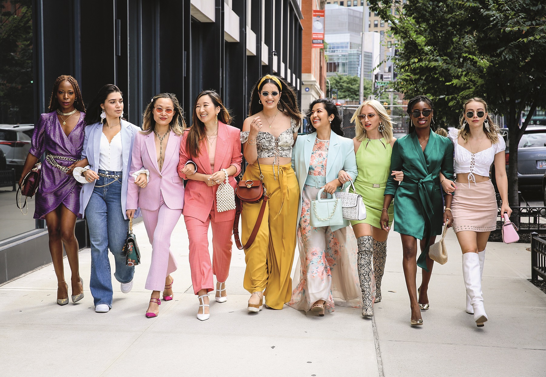 NEW YORK, NEW YORK - SEPTEMBER 07: Guests wearing vibrant outfits walk together during New York Fashion Week at Spring Studios on September 07, 2019 in New York City. (Photo by Donell Woodson/Getty Images)