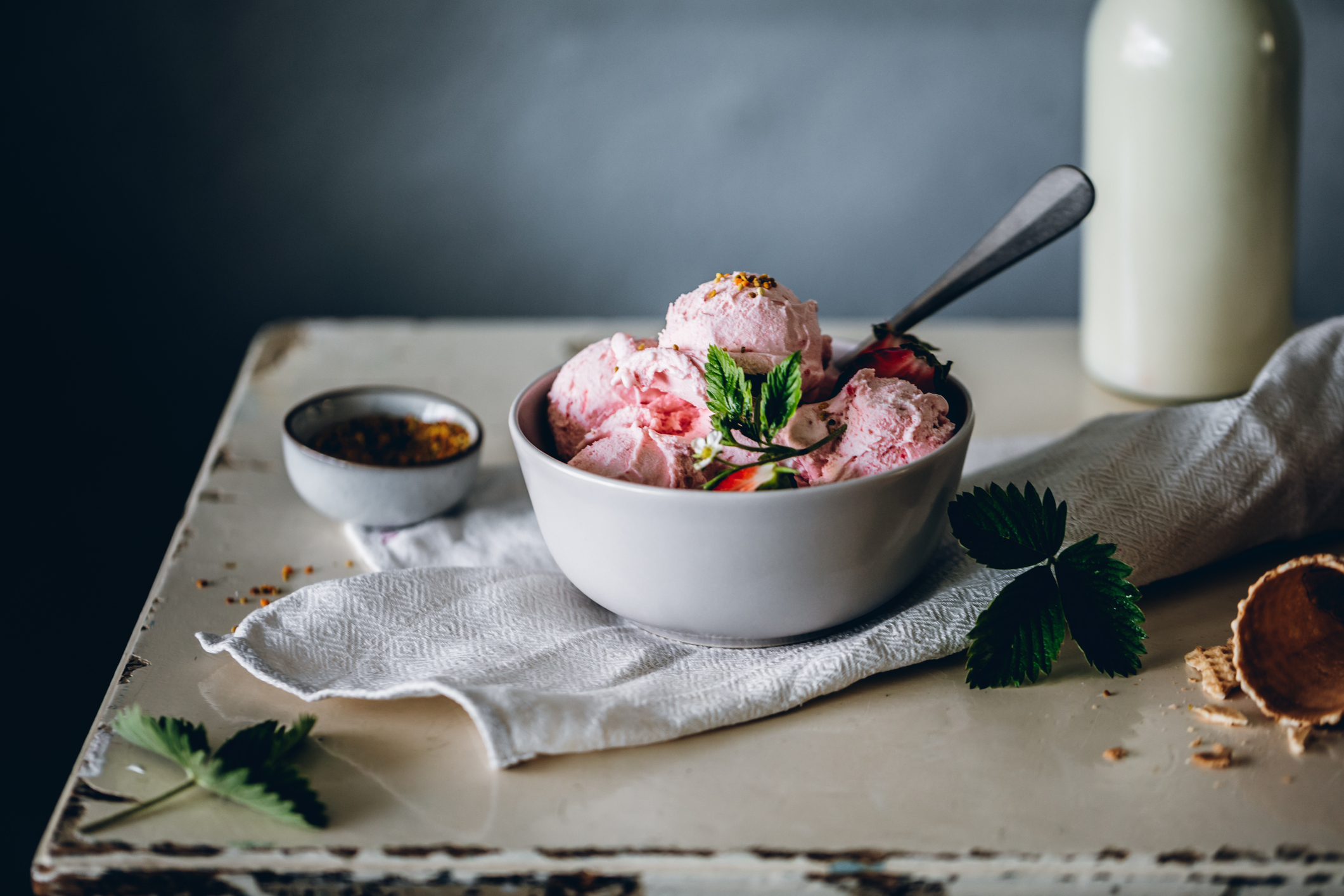 Close-up of strawberry ice cream bowl. Homemade delicious strawberry ice-cream on table.