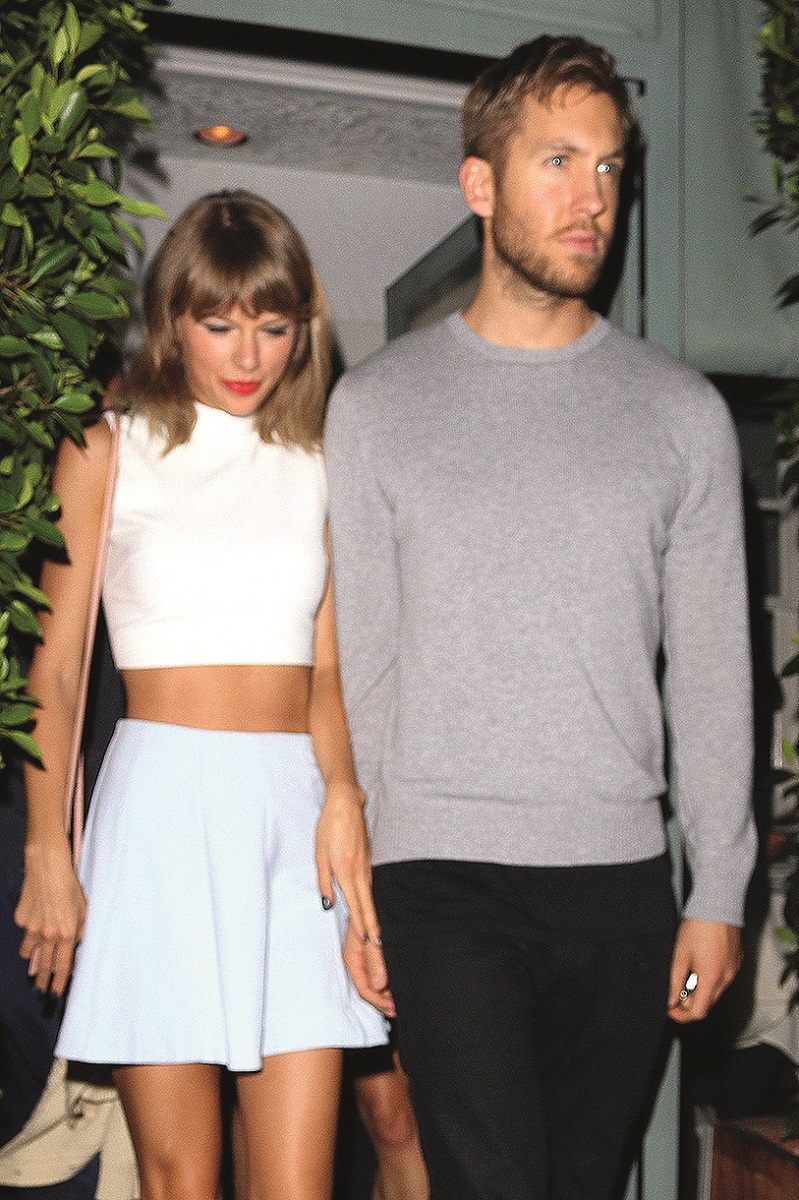 Santa Monica, CA - Taylor Swift and boyfriend Calvin Harris hold hands after a romantic dinner date at Giorgio Baldi Italian restaurant in Santa Monica. The 25-year-old singer showed off her slender figure in a white crop top and baby blue mini skirt. Taylor used Twitter to shoot down reports that she was buying a 16th century castle in Scotland. She tweeted, ‚ÄėCause baby I could build a castle out of all the bricks they threw at me‚Ä¶But I‚Äôm not actually buying a castle.‚ÄĚ.
          August 11, 2015,Image: 255354693, License: Rights-managed, Restrictions: NO Brazil,NO Brazil, Model Release: no, Credit line: AKM Images / Backgrid USA / Profimedia
