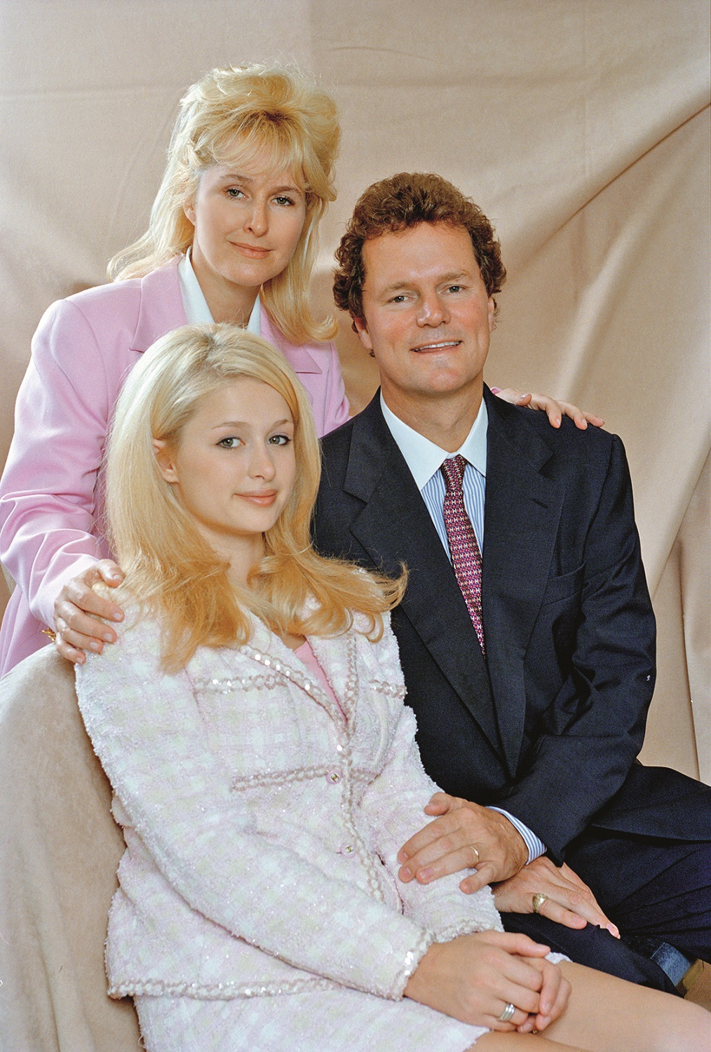 American socialite and television personality Paris Hilton with her parents, Kathy and Richard Hilton, 5th July 1996. (Photo by Colin Davey/Getty Images)