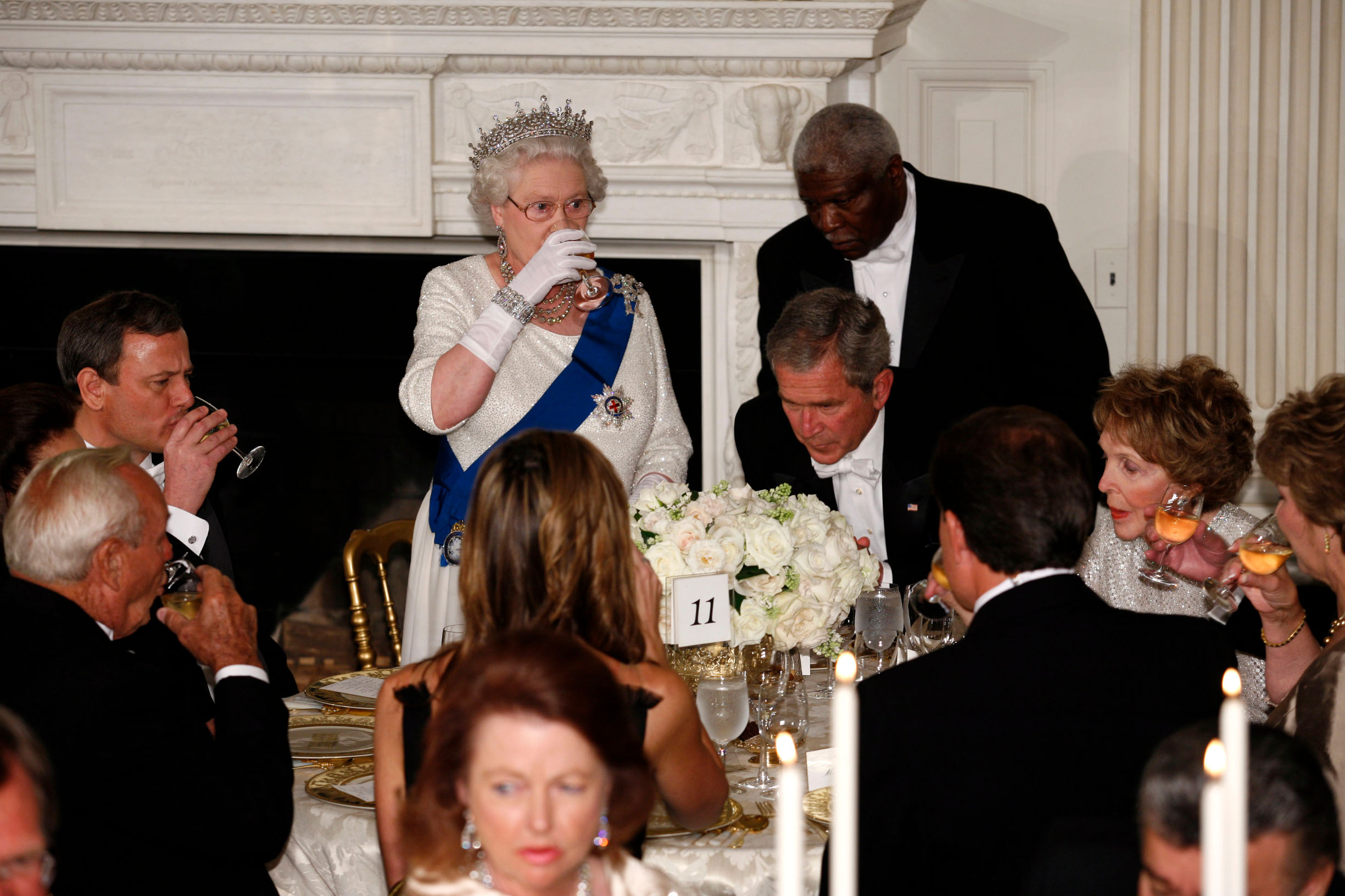 WASHINGTON - MAY 7:  (AFP OUT) Her Majesty Queen Elizabeth II offers a toast to U.S. President George W. Bush and those gathered in the State Dining Room during a formal white-tie state dinner at the White House May 7, 2007 in Washington, DC. Queen Elizabeth II and Prince Phillip, the Duke of Edinburgh are on a six day trip to the United States.  (Photo by Martin H. Simon-Pool/Getty Images)