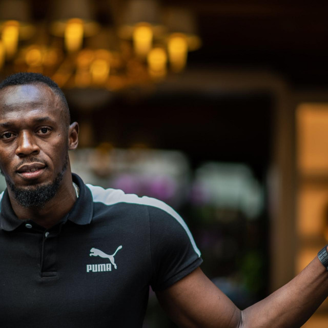 (FILES) In this file photo Jamaican Olympic sprinter Usain Bolt poses during a photo session as he launches a new brand of electric scooters named ”Bolt” in Paris, on May 15, 2019. - Jamaica's Olympic sprint legend Usain Bolt has become a father for the first time after welcoming the birth of a baby girl with partner Kasi Bennett, reports said May 18, 2020. Jamaican Prime Minister Andrew Holness appeared to confirm the birth of Bolt's daughter in a social media post. ”Congratulations to our sprint legend Usain Bolt and Kasi Bennett on the arrival of their baby girl!” Holness wrote on Twitter. (Photo by Martin BUREAU/AFP)