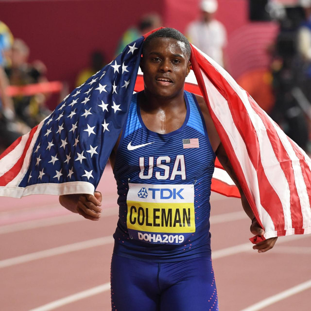 (FILES) This file photo taken on September 28, 2019 shows Christian Coleman of the US reacting after winning the men's 100m final at the 2019 IAAF World Athletics Championships at the Khalifa International stadium in Doha. - Reigning world 100m champion Christian Coleman was provisionally suspended on June 17, 2020 after missing a doping test, the Athletics Integrity Unit said. (Photo by Kirill KUDRYAVTSEV/AFP)