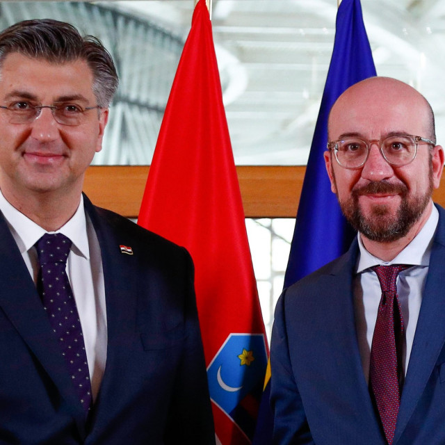 President of the European Council Charles Michel (R) welcomes Croatia's Prime Minister Andrej Plenkovic for a meeting in Brussels on February 8, 2020.