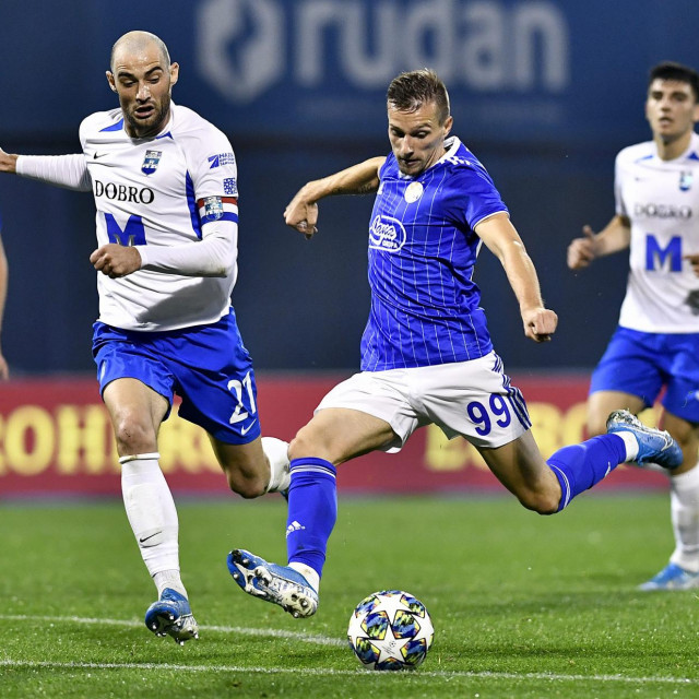 Zagreb, 271019.<br />
Stadion u Maksimiru.<br />
Utakmica 13. kola Hrvatski telekom 1. HNL, GNK Dinamo - NK Osijek.<br />
Na fotografiji: Mile Skoric, Mislav Orsic.<br />