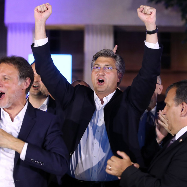 Croatian Prime Minister and leader of the Croatian Democratic Union party (HDZ) Andrej Plenkovic (C) celebrates with party members after declaring the victory on parliamentary elections at the garden of the Archaeological Museum in Zagreb, on July 5. 2020. 