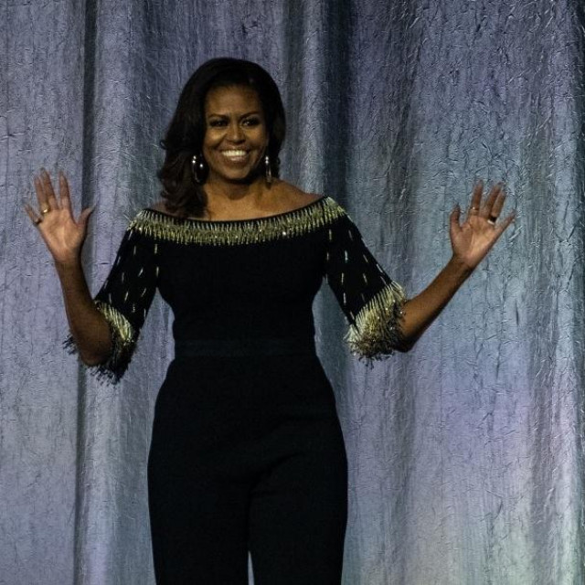 LONDON, ENGLAND - APRIL 14: Michelle Obama on stage as part of her ”Becoming: An Intimate Conversation With Michelle Obama” tour at The O2 Arena on April 14, 2019 in London, England. (Photo by Chris J Ratcliffe/Getty Images)