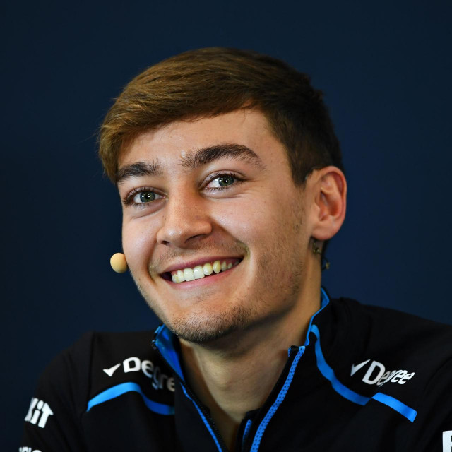 (FILES) In this file photo taken on October 31, 2019 George Russell of Great Britain and Williams talks in the Drivers Press Conference during previews ahead of the F1 Grand Prix of USA at Circuit of The Americas in Austin, Texas. - Russell will step up from Williams to replace world champion Lewis Hamilton, who tested positive for Covid-19, at Formula One&amp;#39;s Sakhir Grand Prix in Bahrain, Mercedes announced on December 2, 2020. Williams reserve Jack Aitken will replace Russell at Williams this weekend, joining regular driver Nicholas Latifi. (Photo by CLIVE MASON/GETTY IMAGES NORTH AMERICA/AFP)