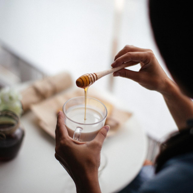 Woman preparing healthy breakfast at home