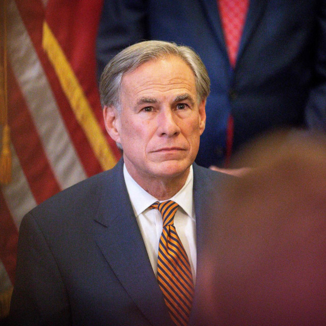 (FILES) In this file photo taken on June 8, 2021 Texas Governor Greg Abbott attends a press conference where he signed Senate Bills 2 and 3 at the Capitol in Austin, Texas. - The Republican governor of Texas, who has been a forceful opponent of mask mandates, has tested positive for Covid-19, his office said Tuesday, one day after attending an indoor public event.&lt;br /&gt;
Greg Abbott, who is fully vaccinated, ”has been testing daily, and today was the first positive test result,” said a statement from his spokesman Mark Miner. (Photo by Montinique Monroe/GETTY IMAGES NORTH AMERICA/AFP)