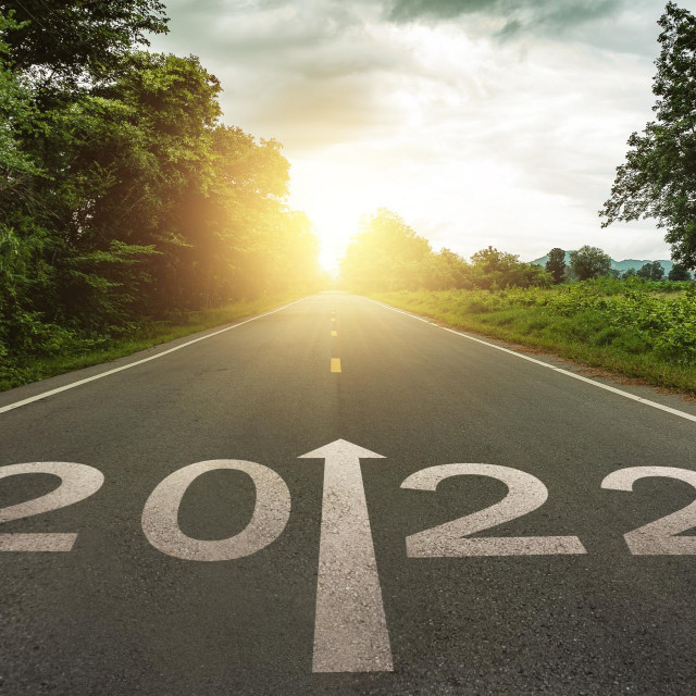 &lt;p&gt;New year 2022 or straightforward concept. Text 2022 written on the road in the middle of asphalt road at sunset.Concept of planning and challenge, business strategy, opportunity,hope, new life change&lt;/p&gt;

