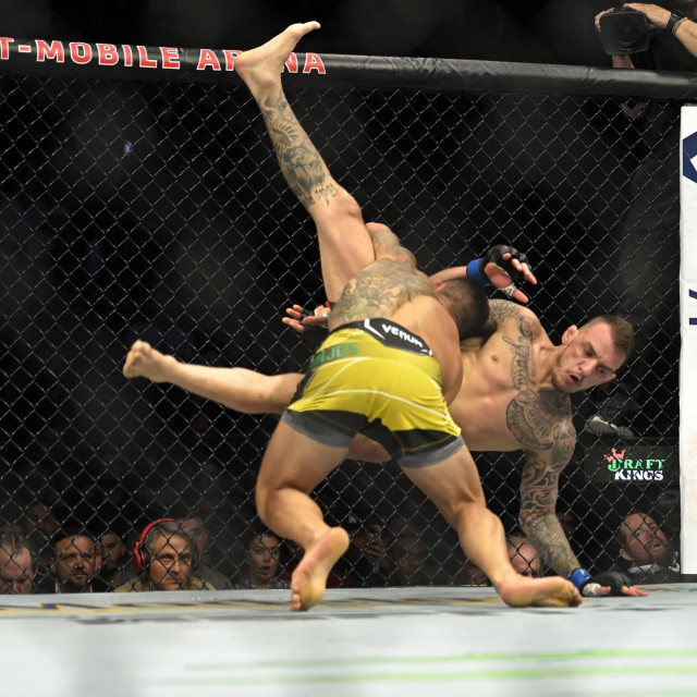 &lt;p&gt;LAS VEGAS, NEVADA - MARCH 05: Rafael Dos Anjos of Brazil and Rafael Fiziev of Kazakhstan fight in their lightweight bout during UFC 272 at T-Mobile Arena on March 05, 2022 in Las Vegas, Nevada. David Becker/Getty Images/AFP&lt;br /&gt;
== FOR NEWSPAPERS, INTERNET, TELCOS &amp; TELEVISION USE ONLY ==&lt;/p&gt;
