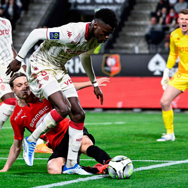 &lt;p&gt;Rennes� French midfielder Lovro Majer (2L) fights for the ball with Monaco�s French defender Benoit Badiashile Mukinayi (2R) during the French L1 football match between Stade Rennais and Monaco (ASM) at the Roazhon Park stadium in Rennes, on April 15, 2022. (Photo by Damien Meyer/AFP)&lt;/p&gt;