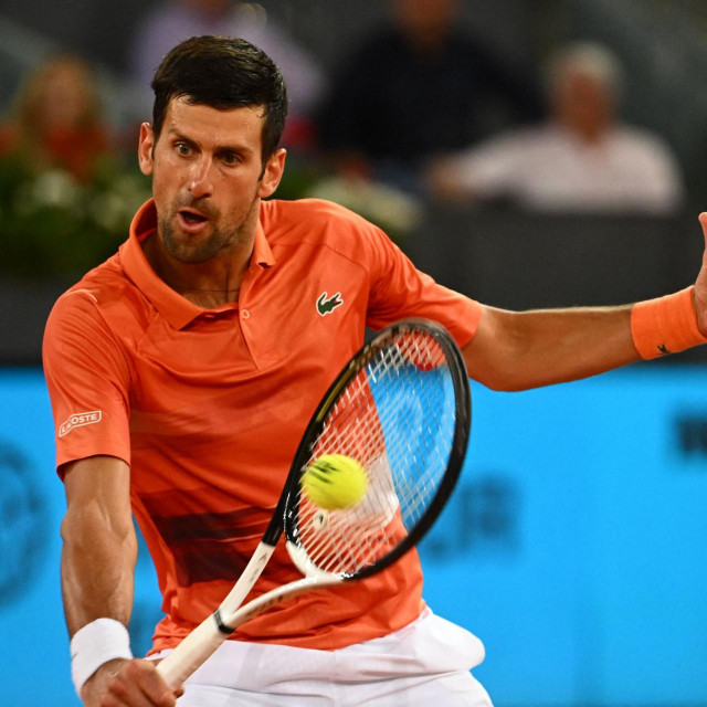 &lt;p&gt;Serbia&amp;#39;s Novak Djokovic returns the ball to France&amp;#39;s Gael Monfils during their 2022 ATP Tour Madrid Open tennis tournament singles match at the Caja Magica in Madrid on May 3, 2022. (Photo by GABRIEL BOUYS/AFP)&lt;/p&gt;