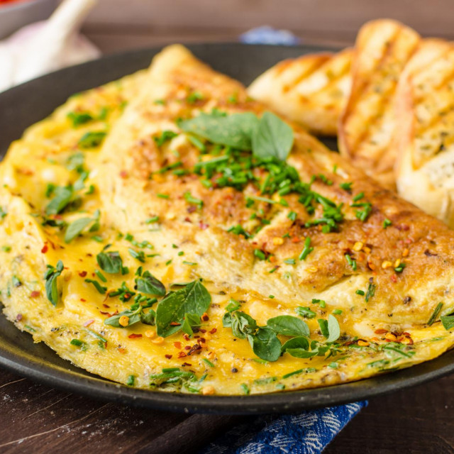 &lt;p&gt;Herb omelette with chives and oregano sprinkled with chili flakes, garlic panini toasts&lt;/p&gt;