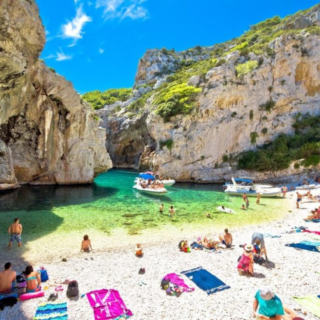 &lt;p&gt;Vis, Croatia, August 21 2021Famous Stiniva beach on Vis island summer view. Beach is located in stone canyon and is amazing geological phenomenon. Famous tourist destination in Dalmatia, Croatia.&lt;/p&gt;