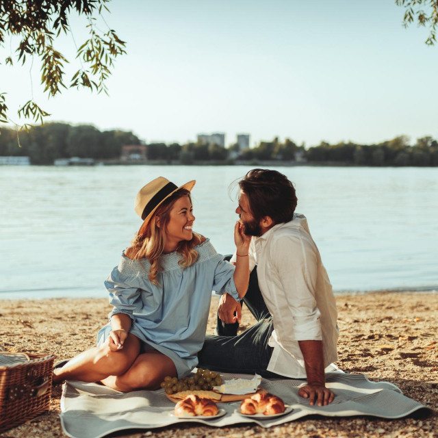 &lt;p&gt;Full length portrait of young couple having good times on a picnic date.&lt;/p&gt;