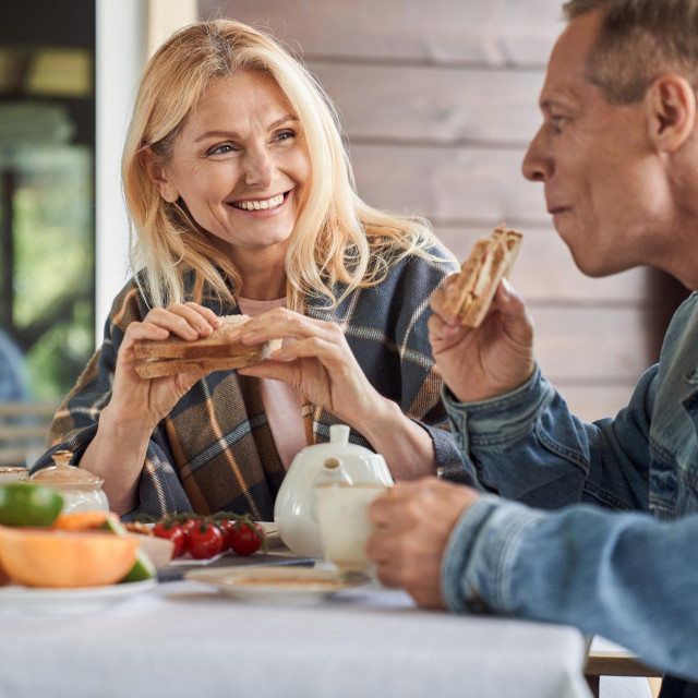 &lt;p&gt;Smiling mature man and woman are having toasts with vegetables and hot drinks on terrace in countryside&lt;/p&gt;