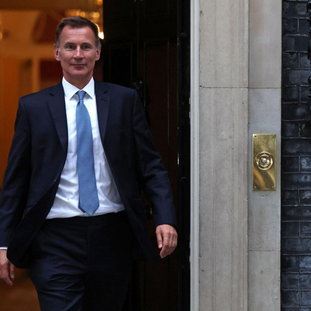 &lt;p&gt;Britain‘s new Chancellor of the Exchequer Jeremy Hunt leaves 10 Downing Street in central London on October 14, 2022, after having a meeting with Britain‘s Prime Minister Liz Truss. - Newly appointed UK finance minister Jeremy Hunt is a mild-mannered political survivor who will require all of his considerable experience to calm an economy and government beset by chaos. (Photo by ISABEL INFANTES/AFP)&lt;/p&gt;
