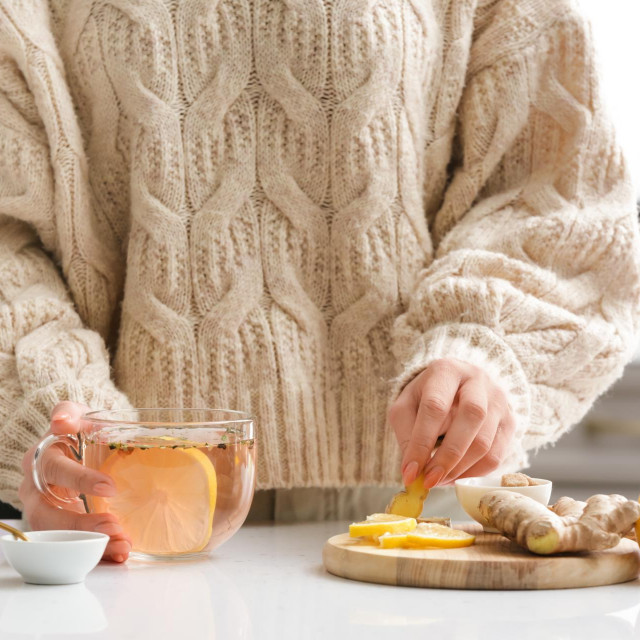 &lt;p&gt;Woman making healthy tea with ginger and lemon in kitchen&lt;/p&gt;