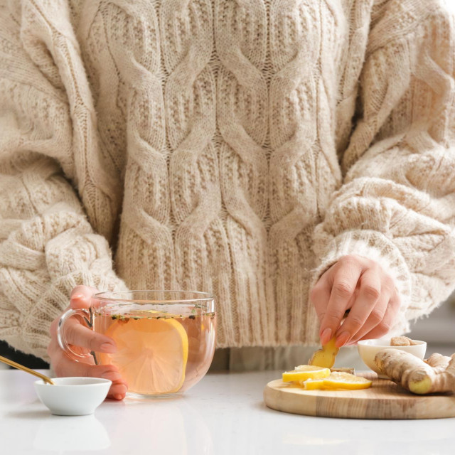 &lt;p&gt;Woman making healthy tea with ginger and lemon in kitchen&lt;/p&gt;