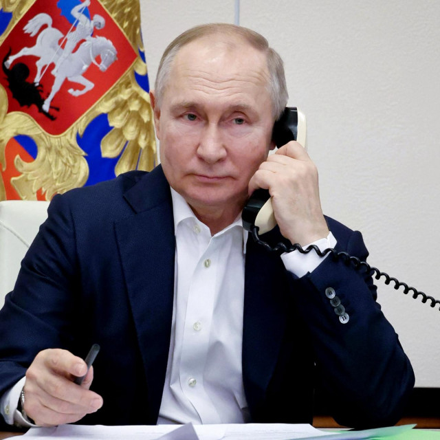 &lt;p&gt;Russian President Vladimir Putin talks on the phone with Agatha Bylkova, a eight-year-old girl from the Kurgan region who took part in the New Year Tree of Wishes nationwide charity campaign, in Moscow on January 3, 2023. (Photo by Mikhail Klimentyev/SPUTNIK/AFP)&lt;/p&gt;