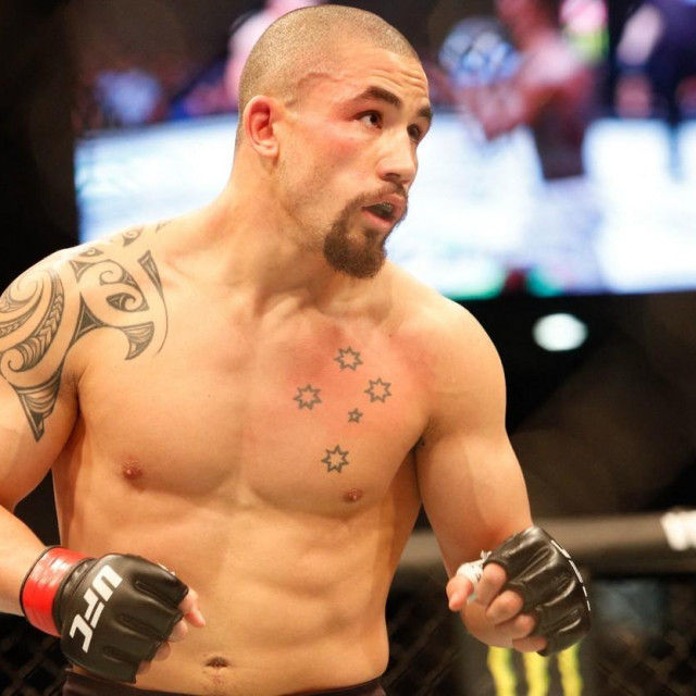 &lt;p&gt;Robert Whittaker of Australia in action against Israel Adesanya of New Zealand during the middleweight title bout of the UFC 243 fight night in Melbourne on October 6, 2019.,Image: 475307379, License: Rights-managed, Restrictions: -- IMAGE RESTRICTED TO EDITORIAL USE - STRICTLY NO COMMERCIAL USE --, Model Release: no, Credit line: ASANKA BRENDON RATNAYAKE/AFP/Profimedia&lt;/p&gt;