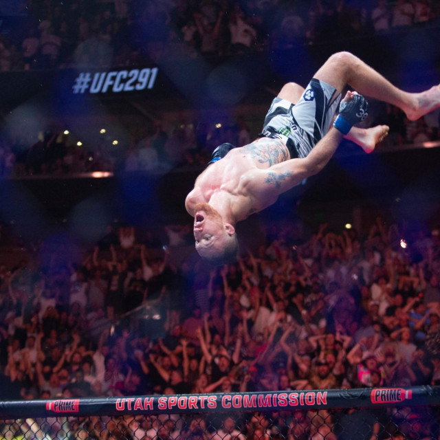 SALT LAKE CITY, UT - JULY 29: Justin Gaethje flips after beating Dustin Poirier during their BMF Title Lightweight fight at UFC 291 at the Delta Center July 29, 2023 at the in Salt Lake City, Utah. Chris Gardner/Getty Images/AFP (Photo by CHRIS GARDNER/GETTY IMAGES NORTH AMERICA/Getty Images via AFP)