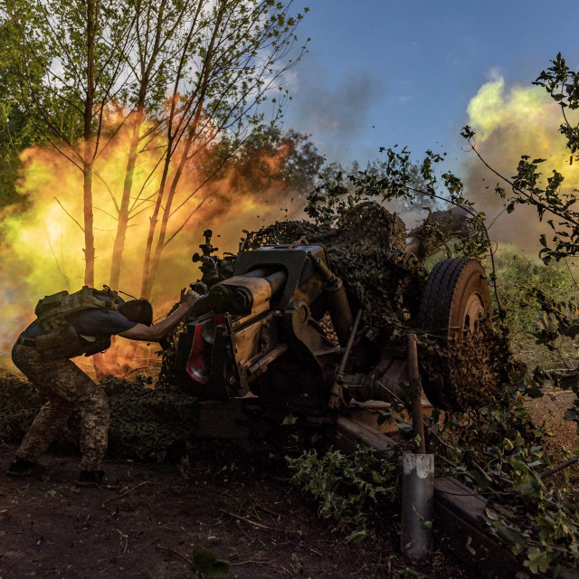 DONETSK OBLAST, UKRAINE - AUGUST 12: Ukrainian soldiers fire with D-30 artillery at Russian positions in the direction of Klishchiivka as the Russia-Ukraine war continues in Donetsk Oblast, Ukraine on August 12, 2023. Diego Herrera Carcedo/Anadolu Agency (Photo by Diego Herrera Carcedo/ANADOLU AGENCY/Anadolu Agency via AFP)