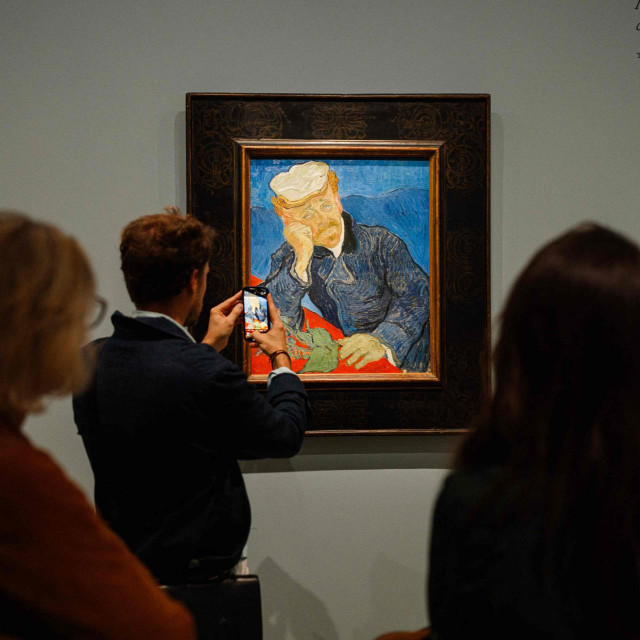 &lt;p&gt;Visitors look at ”Le Docteur Paul Gachet”, a painting by Vincent Van Gogh during the press preview of the exhibition ”Van Gogh in Auvers-sur-Oise, last months” at Orsay Museum in Paris on September 29, 2023. (Photo by Dimitar DILKOFF/AFP)&lt;/p&gt;