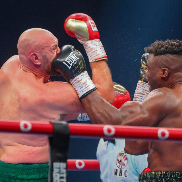 Britain‘s Tyson Fury (L) fights against Cameroonian-French Francis Ngannou during their heavyweight boxing match in Riyadh early on October 29, 2023. (Photo by Fayez NURELDINE/AFP)