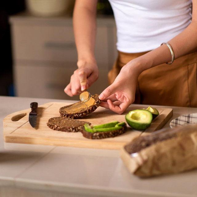 &lt;p&gt;Woman making avocado peanut butter toast for a healthy breakfast at home&lt;/p&gt;