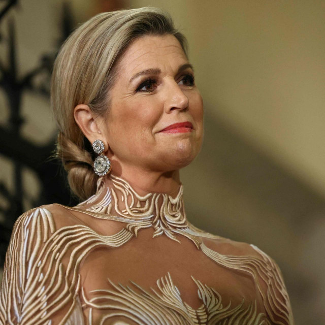 &lt;p&gt;Queen Maxima of the Netherlands looks on during the opening of the exhibition ‘Iris van Herpen: Sculpting the Senses‘ at the Musee des Arts Decoratifs, in Paris, on November 28, 2023. The exhibition, inaugurated on November 28, 2023 by Queen Maxima of the Netherlands and Brigitte Macron opens to the general public on Novemeber 29, 2023 and features 100 haute couture dresses by the Dutch couturier. (Photo by Thomas SAMSON/AFP)&lt;/p&gt;