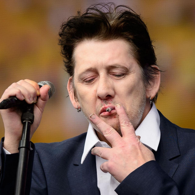 &lt;p&gt;(FILES) Shane MacGowan of British group The Pogues performs on stage at the British Summer Time festival in Hyde Park in central London, on July 5, 2014. Shane MacGowan, songwriter and lead singer of folk-punk group The Pogues, has died aged 65 after a long illness, his wife announced on November 30, 2023. (Photo by LEON NEAL/AFP)&lt;/p&gt;