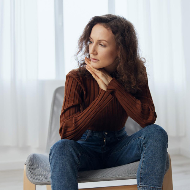 &lt;p&gt;Heavy thoughts concept. Frustrated pensive thoughtful curly adorable woman reclines on hand lost in sad thoughts about irreparable mistake decision about abortion sit in chair at home looks aside&lt;/p&gt;