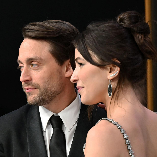 US actor Kieran Culkin and his wife Jazz Charton arrive for the 75th Emmy Awards at the Peacock Theatre at L.A. Live in Los Angeles on January 15, 2024. (Photo by Robyn BECK/AFP)