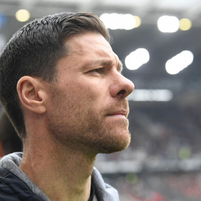 Bayer Leverkusen‘s Spanish head coach Xabi Alonso looks on prior to the German first division Bundesliga football match between SC Freiburg and Bayer 04 Leverkusen in Freiburg, southern Germany, on March 17, 2024. (Photo by THOMAS KIENZLE/AFP)/DFL REGULATIONS PROHIBIT ANY USE OF PHOTOGRAPHS AS IMAGE SEQUENCES AND/OR QUASI-VIDEO