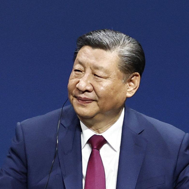 China‘s President Xi Jinping listens as France‘s President addresses the sixth meeting of the Franco-Chinese Business Council at The Marigny Theatre in Paris on May 6, 2024, during an official two-day state visit hosted by the French president. (Photo by MOHAMMED BADRA/POOL/AFP)
