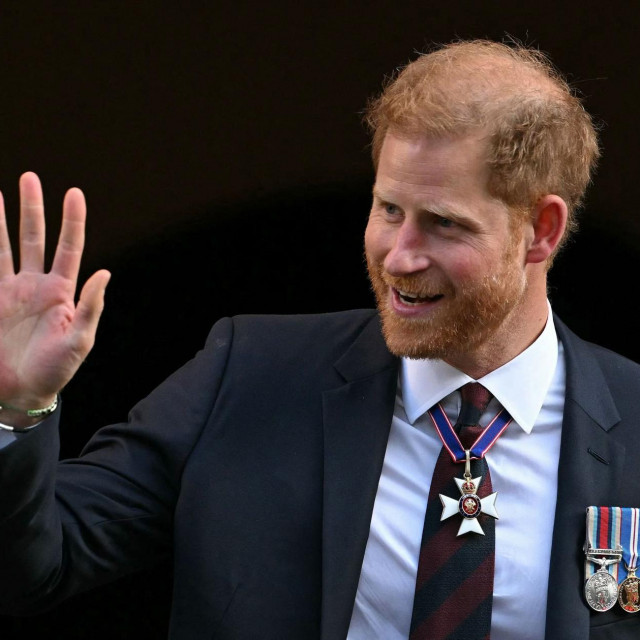 Britain‘s Prince Harry, Duke of Sussex waves as he leaves after attending a ceremony marking the 10th anniversary of the Invictus Games, at St Paul‘s Cathedral in central London, on May 8, 2024. (Photo by JUSTIN TALLIS/AFP)