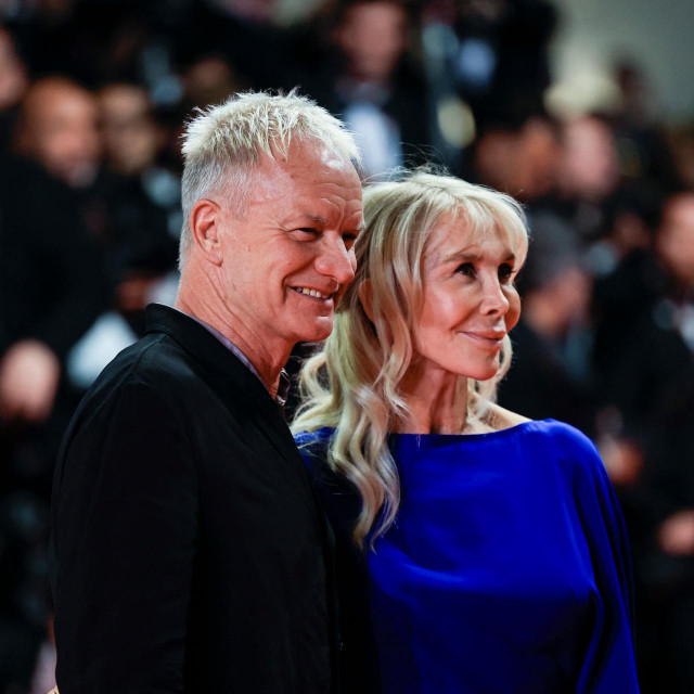 British singer and songwriter Sting and his wife Trudie Styler arrive for the screening of the film ”Parthenope” at the 77th edition of the Cannes Film Festival in Cannes, southern France, on May 21, 2024. (Photo by Valery HACHE/AFP)