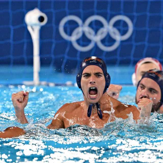 Montenegro‘s #07 Stefan Vidovic (C) celebrates after scoring in the men‘s water polo preliminary round group A match between Croatia and Montenegro during the Paris 2024 Olympic Games at the Aquatics Centre in Saint-Denis, north of Paris, on July 28, 2024. (Photo by Andreas SOLARO/AFP)