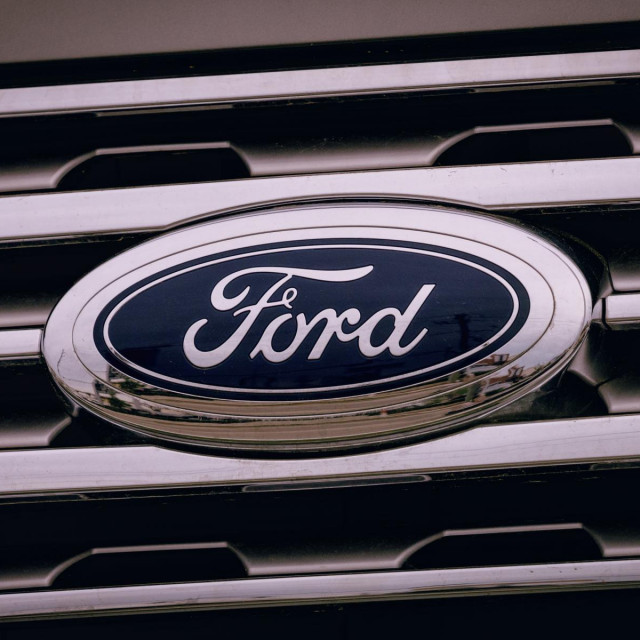 A Ford grille emblem on a new Ford car in the lot at Mac Haik Ford, 10333 Katy Freeway in Houston, Texas.