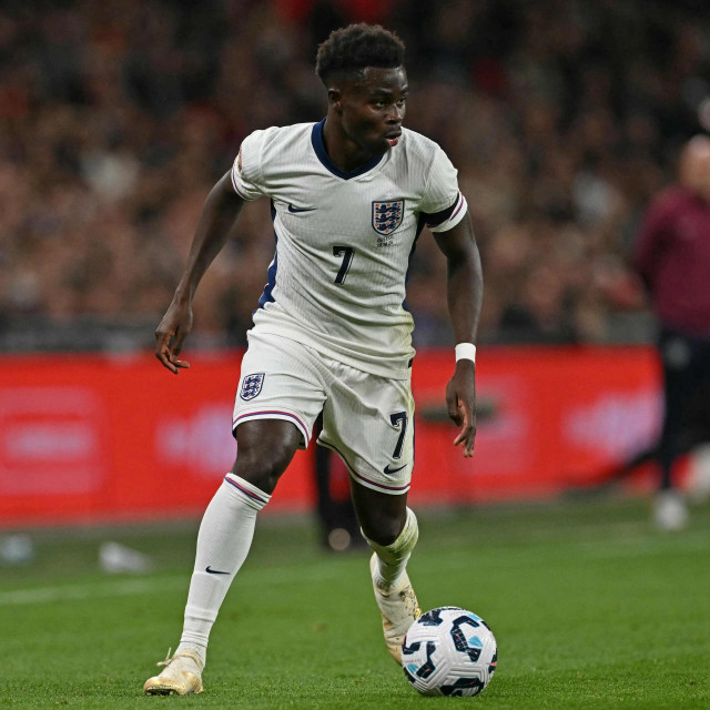 England‘s midfielder #07 Bukayo Saka looks to play a pass during their UEFA Nations League, League B - Group 2, football match between England and Greece at Wembley Stadium in London on October 10, 2024. (Photo by Glyn KIRK/AFP)/NOT FOR MARKETING OR ADVERTISING USE/RESTRICTED TO EDITORIAL USE