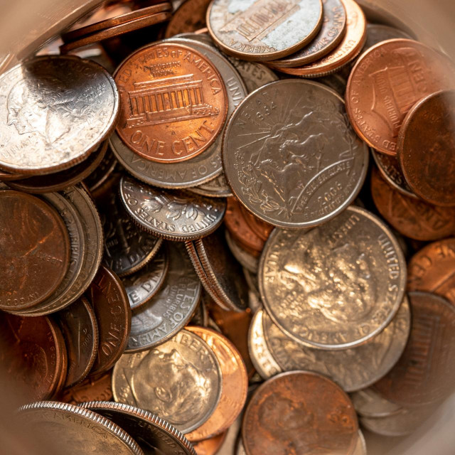 US change money in a jar. Top view