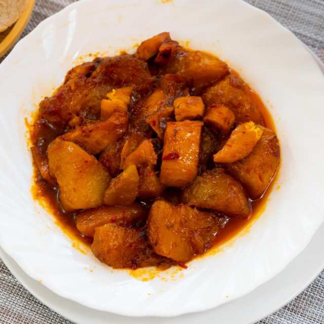 Popular spanish dish Patatas con sepia, stewed cuttle with potatoes and souse