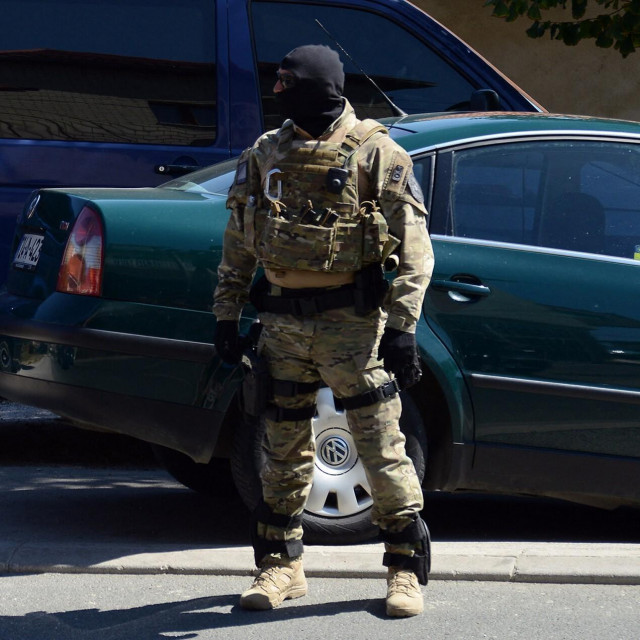 Bosnian Special Police Forces officer secures the perimeter during an arrest operation in Sarajevo, on August 30, 2017. Bosnian police have arrested one individual, and search the premises for weapons or explosive materials. Bosnian State Prosecutor Office stated that the individual was recently deported from Austria as being related to potential risk of terrorism and connections with persons who returned from wars in Syria and Iraq.,Image: 347712364, License: Rights-managed, Restrictions:, Model Release: no, Credit line: ELVIS BARUKCIC/AFP/Profimedia