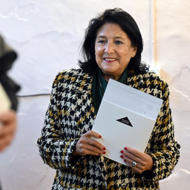 Georgian President Salome Zurabishvili votes in the country‘s parliamentary elections at a polling station in Tbilisi on October 26, 2024. (Photo by Vano SHLAMOV/AFP)